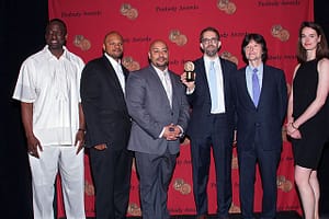 Yusef Salaam, Kevin Richardson, Raymond Santana, David McMahon, Ken Burns and Stephanie Jenkins with the Peabody Award for "The Central Park Five" documentary. Photo Credit: Creative Commons Attribution 2.0