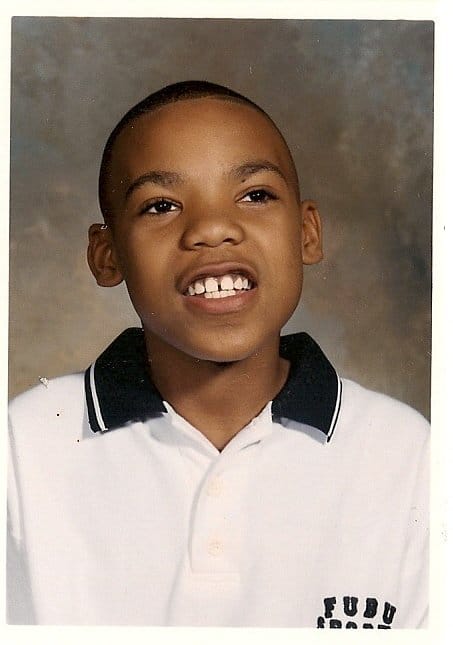 Me, Deron Dalton, cheesing for a picture day during grade school in Grandview, Mo. in the late '90s.